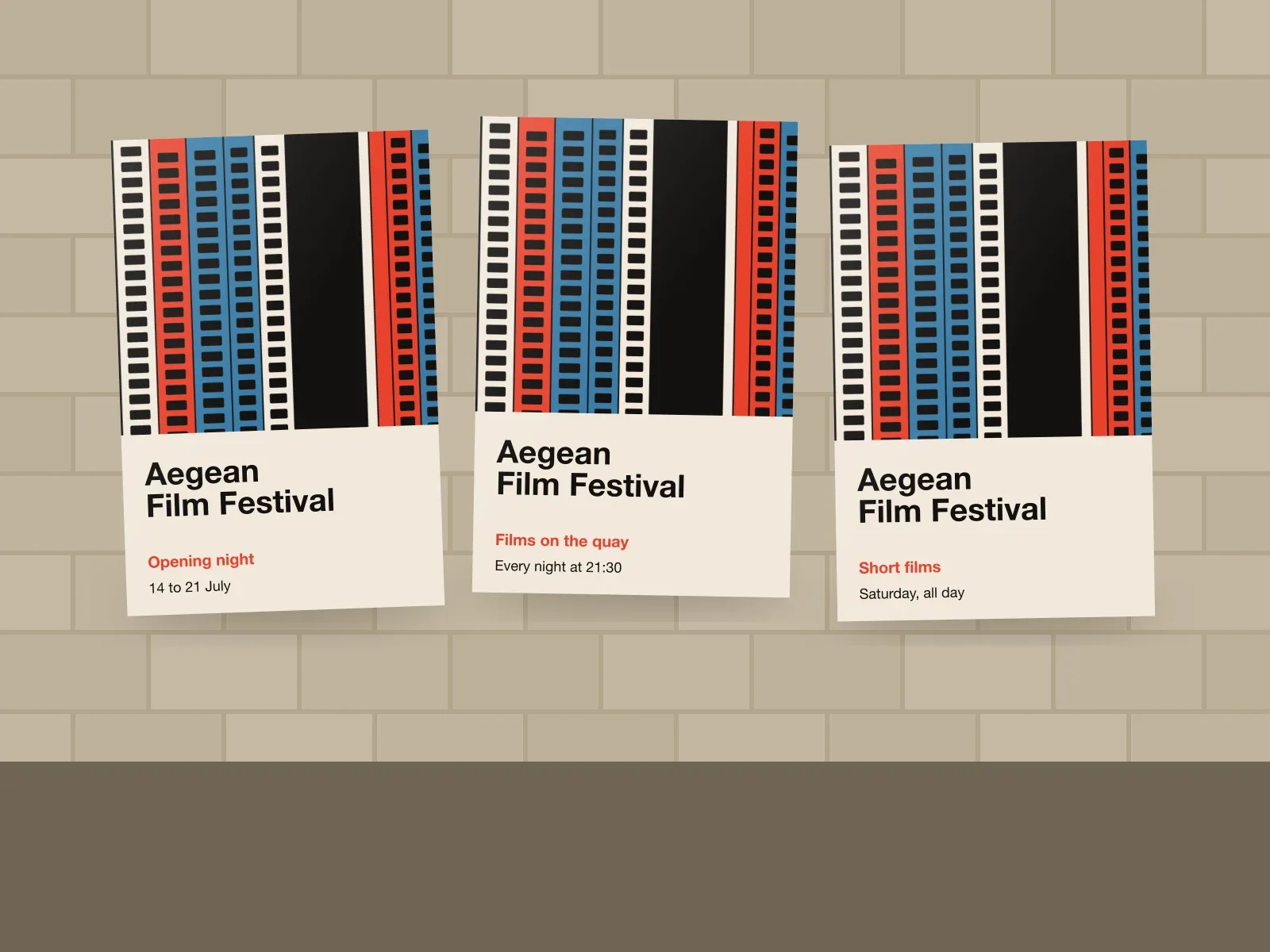 Aegean Film Festival posters pasted on a harbour wall, each built from film strip bars